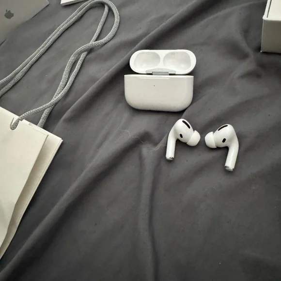 Apple AirPods Pro with White Shopping Bag